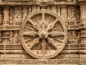 A chariot wheel carved into the temple wall at Konark, India.