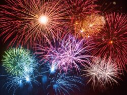 Colorful firework display in night sky.